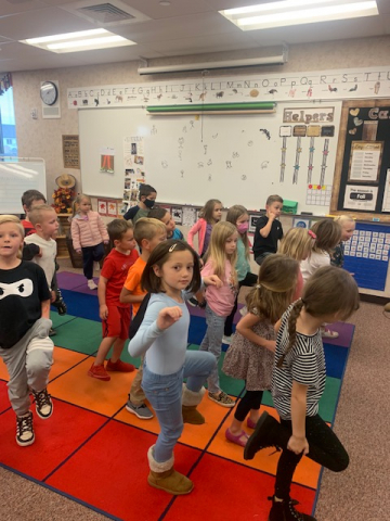 Kindergarten students dancing.