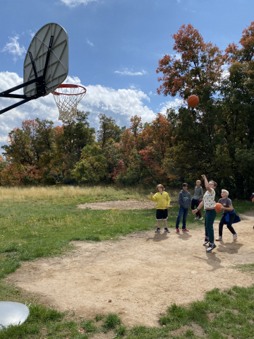 Students playing basketball at Shadow Mountain.