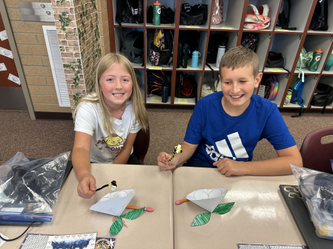 Students working with a partner to learn about plant structure and function.