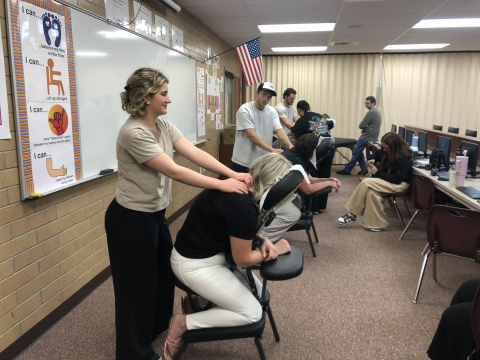 Teachers getting massages.