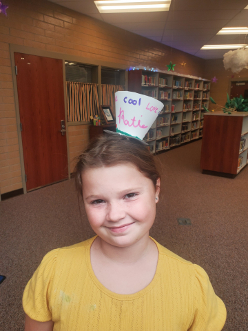 Student wearing paper hat