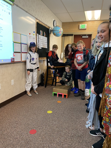 Fifth grade class playing a Halloween game.