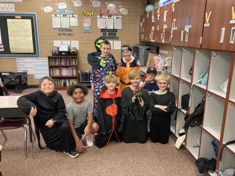 Fourth grade students in Halloween costumes.