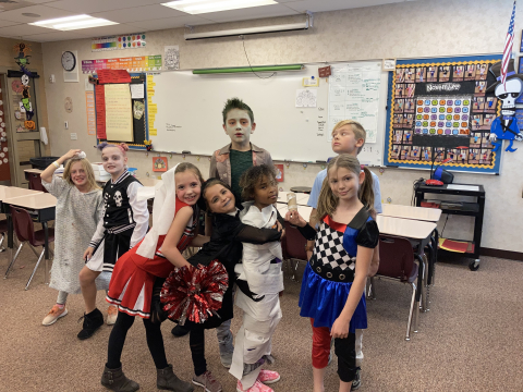 Students in Halloween costumes.