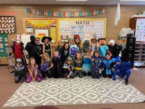 Second grade class in Halloween costumes.