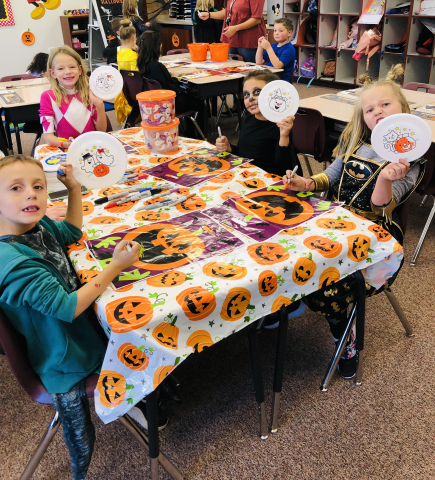 Students participating in a Halloween activity.