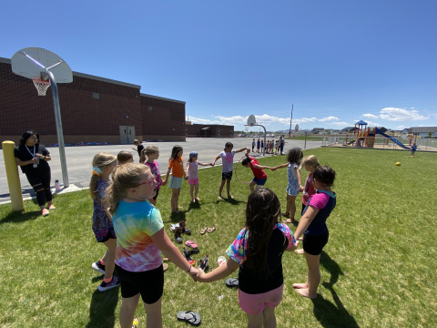 Students playing a game at field day.