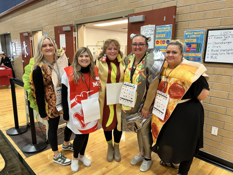 Second grade teachers dressed as lunch items.