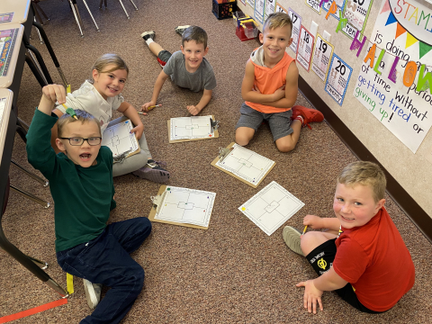First graders working on writing.