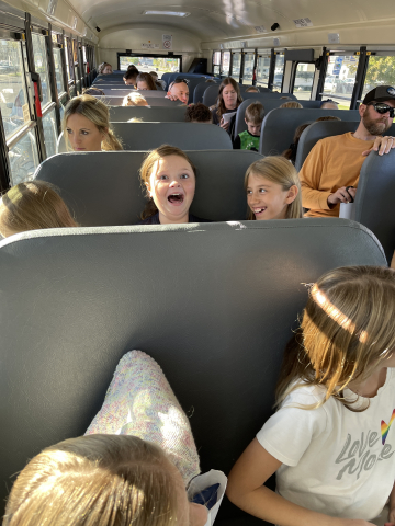 4th graders on the bus.