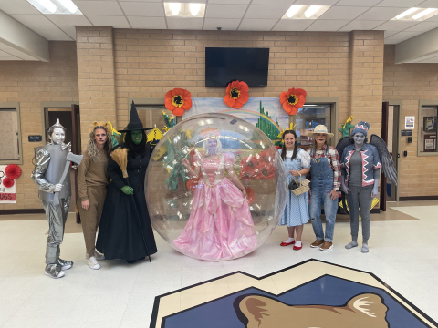 Office staff dressed as characters from the Wizard of Oz.