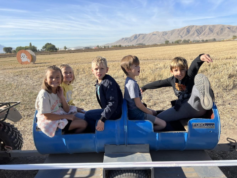 Second graders riding the train on the field trip.