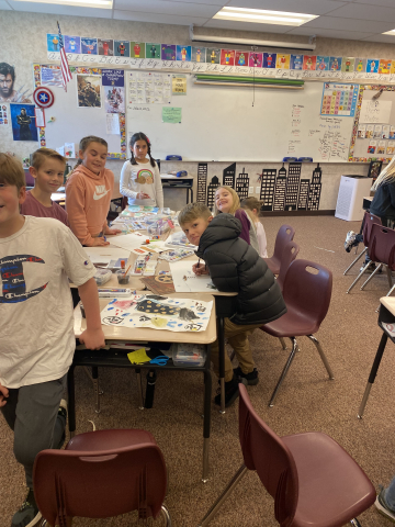 Students working on creating artwork.