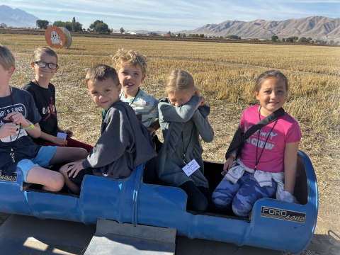 Second graders riding the train on the field trip.