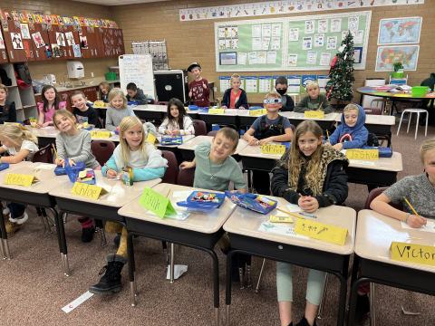 Ms. Graves' class learning about making Christmas cards.