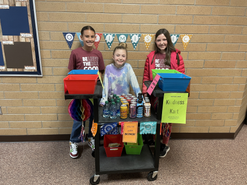 A few student council members with the Kindness Cart.