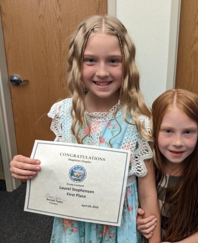 Laurel Stephenson--1st place winner of essay contest with her certificate.