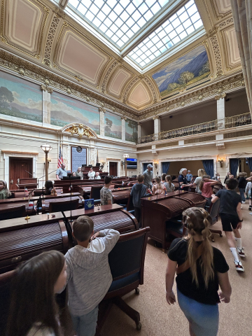 Students touring the house floor of the Utah State Capitol building.