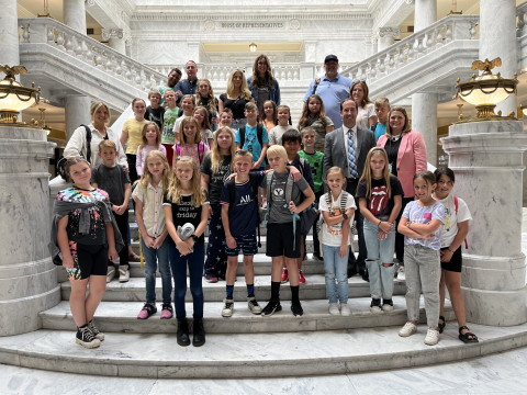 Mrs. Olson's class on the capitol steps with Representative Whyte.