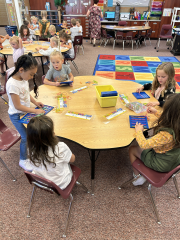 Kindergarteners playing with blocks on their first day of school.