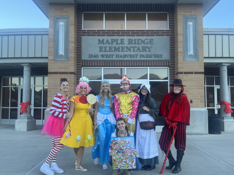 First grade teachers dressed as CandyLand characters.