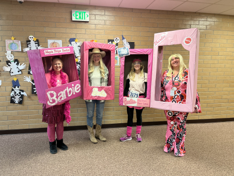 Fifth grade teachers dressed as Barbies.