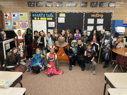 A class dressed in their costumes.