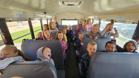 Kindergarten students on the bus.
