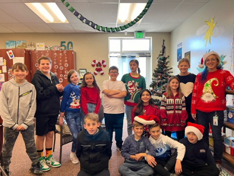 Some of Mrs. Kruse's 5th graders in ugly Christmas sweaters.