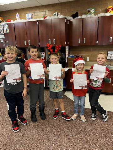 Students showing Christmas work.