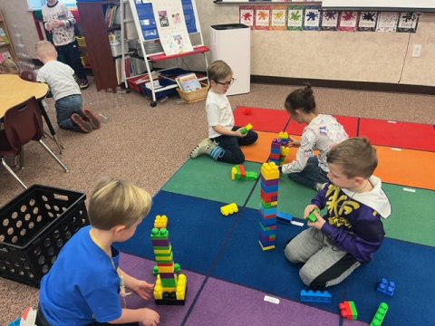 Students building with blocks.