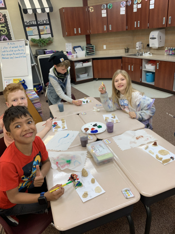 Students working on their play dough models.