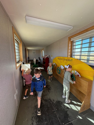 Students exploring at the pumpkin patch.