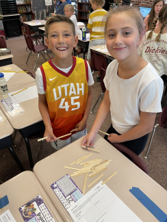 Students created bridges with popsicle sticks.
