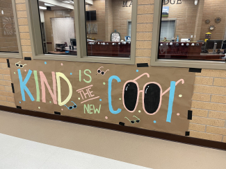 Kind is the New Cool sign.