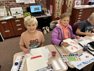 Students watercoloring.