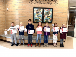 PTA Reflections Council Winners holding their certificates.