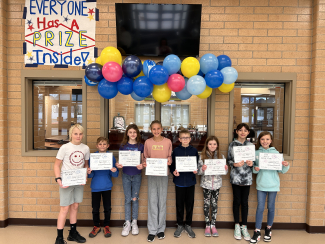 Science Fair winners holding their certificates.