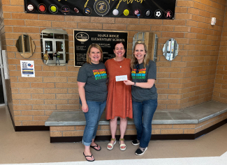 PTA presents Mrs. Matis with a check.